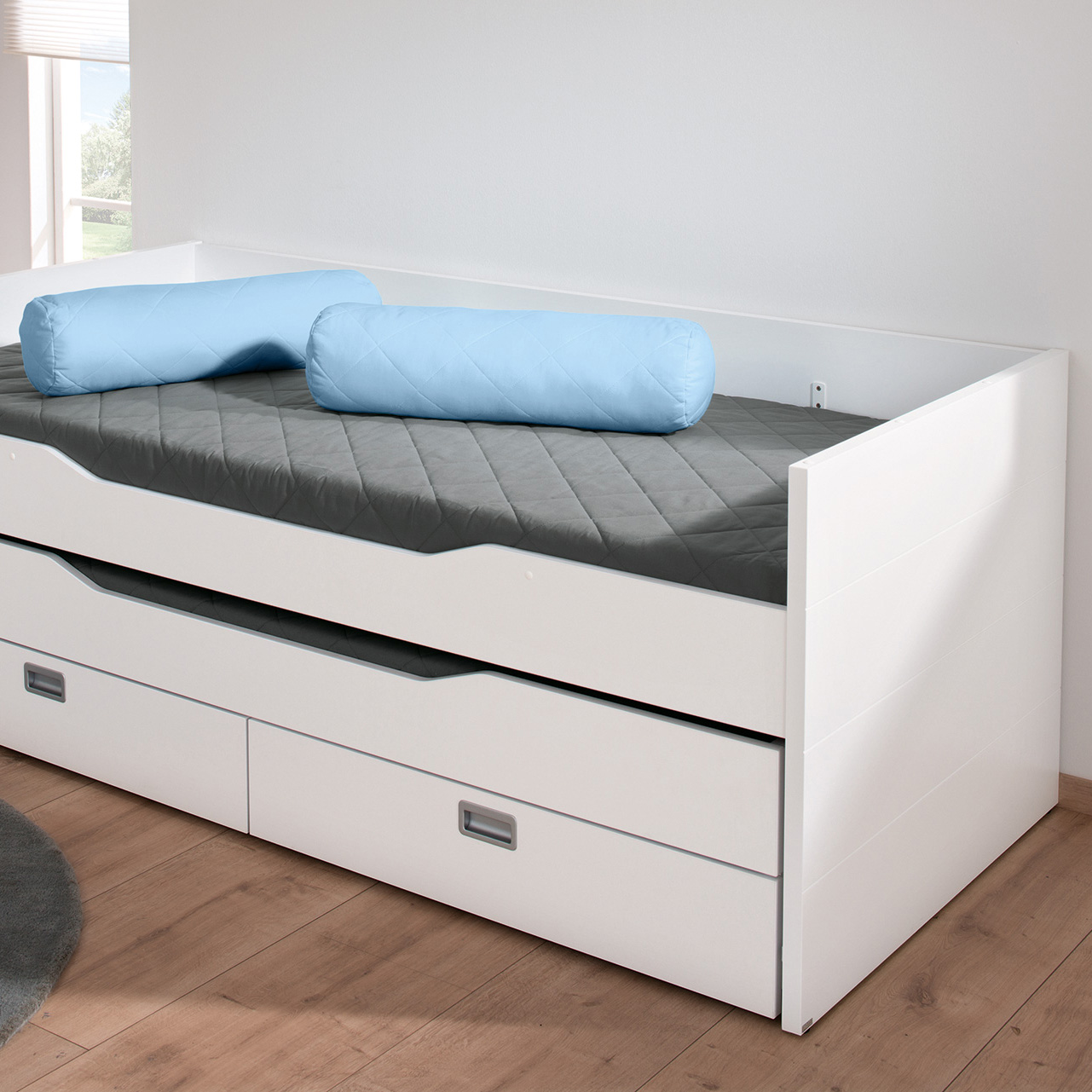 Kissenrolle aus Baumwolle Hellblau